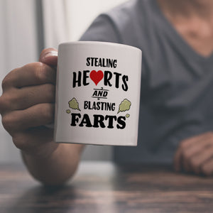 Stealing hearts and blasting farts Kaffeebecher