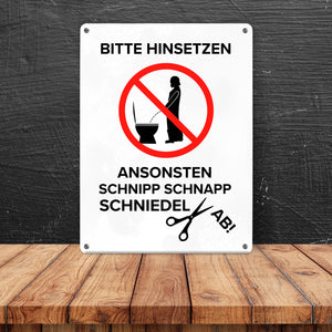 Bitte hinsetzen, ansonsten… Toilette Metallschild mit Filmfigur