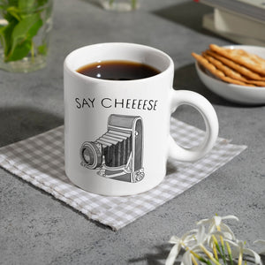 Say cheeeese Kaffeebecher für Fotografen mit Retro Kamera Motiv
