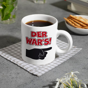 Der war’s Kaffeebecher mit beschuldigender Hand