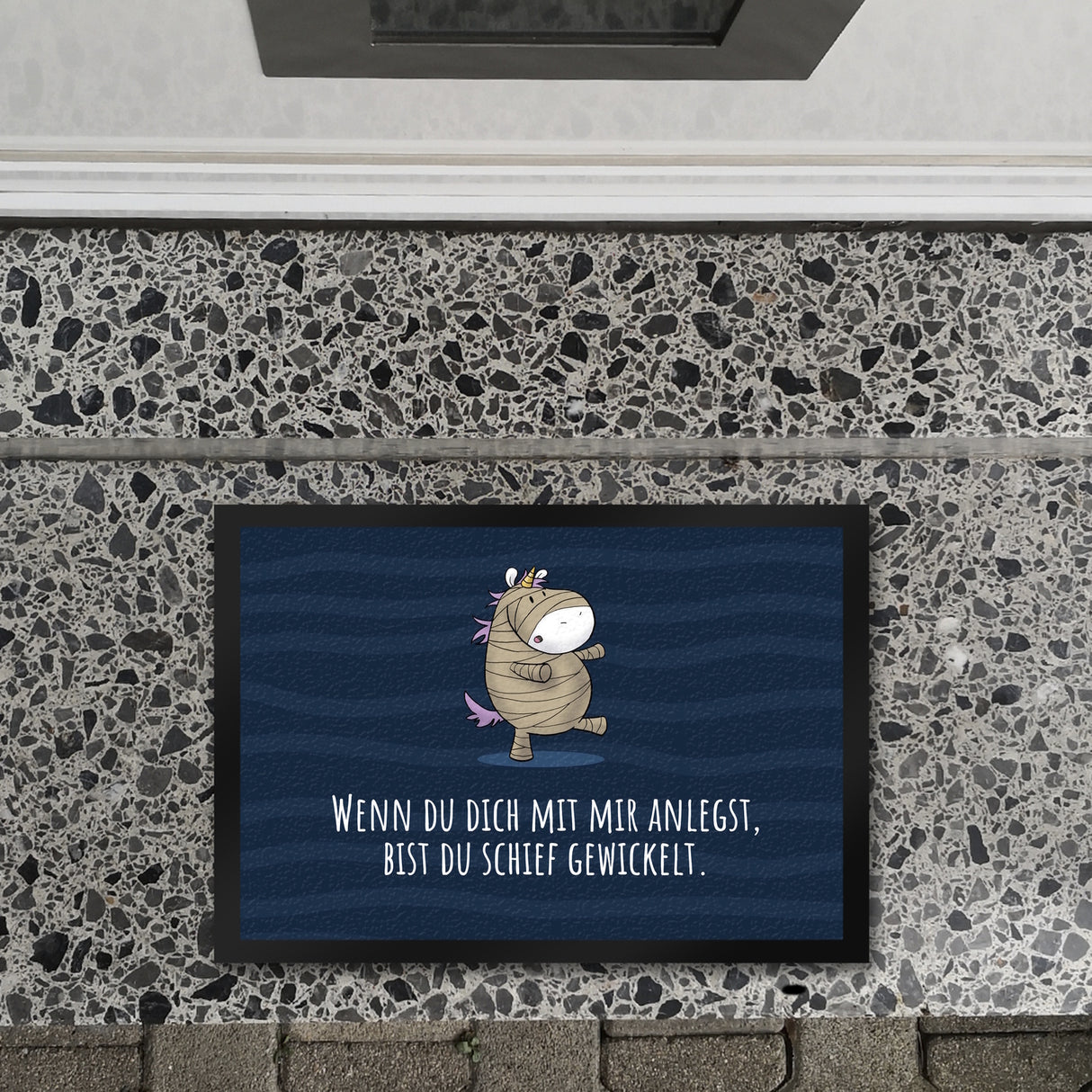 Einhorn-Mumie Fußmatte in 35x50 cm mit Spruch Du bist schief gewickelt