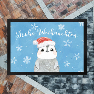 Pinguin mit Weihnachtsmütze Fußmatte in 35x50 cm und Spruch Frohe Weihnachten