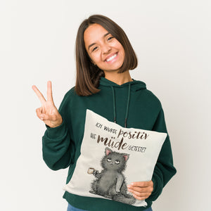 Genervte Katze Kissen mit Spruch positiv auf müde getestet