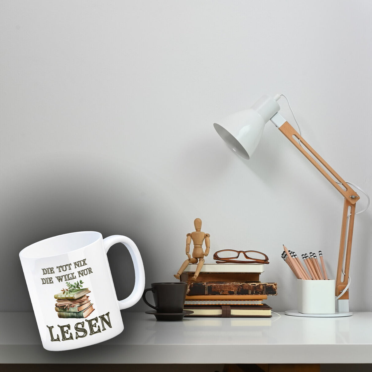 Bücher Kaffeebecher mit Spruch Die tut nix die will nur lesen