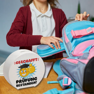 Prüfung bestanden Spardose mit Gesicht und Daumen hoch