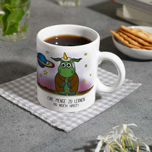Honeycorns Kaffeebecher mit Weltraum Einhorn Motiv und Spruch: Eine Menge zu lernen ...